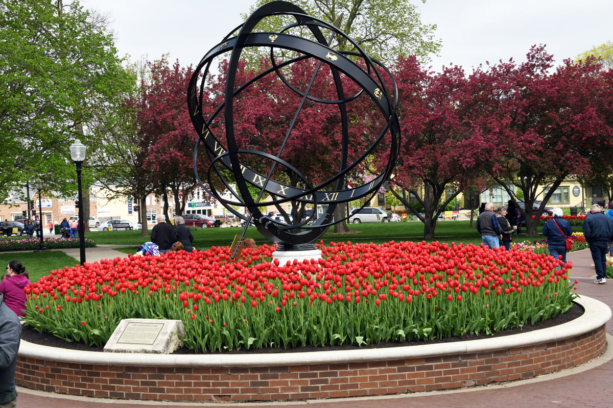 203 The sundial in Central Park is surrounded by a bed of tulips.JPG